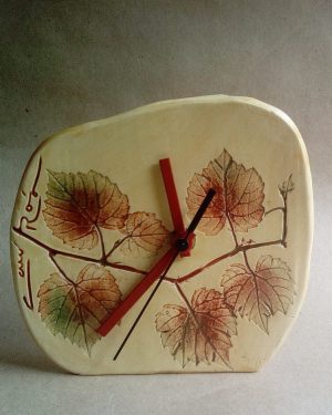 reloj hojas marrón pequeño